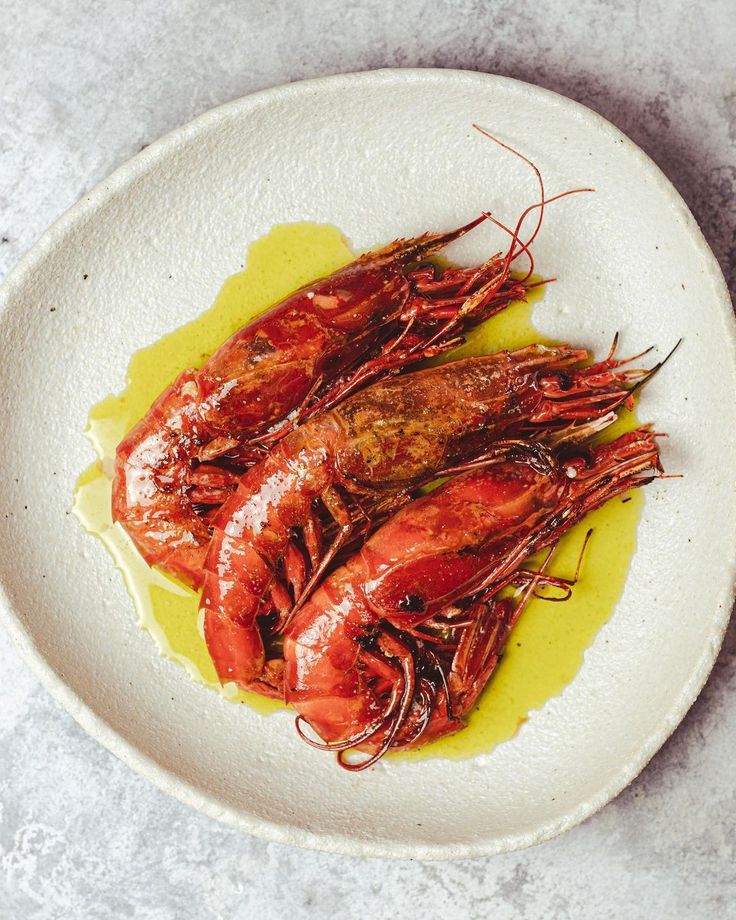 Storm Ashdown on Instagram_ “Carabineros, chive & lime butter Carabineros; the true kings of the crustaceans_ Sporting a deep scarlet red shell, their flesh is…”